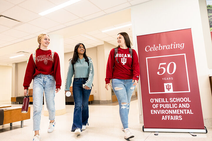 SPEA students walking in a building on the Bloomington campus.